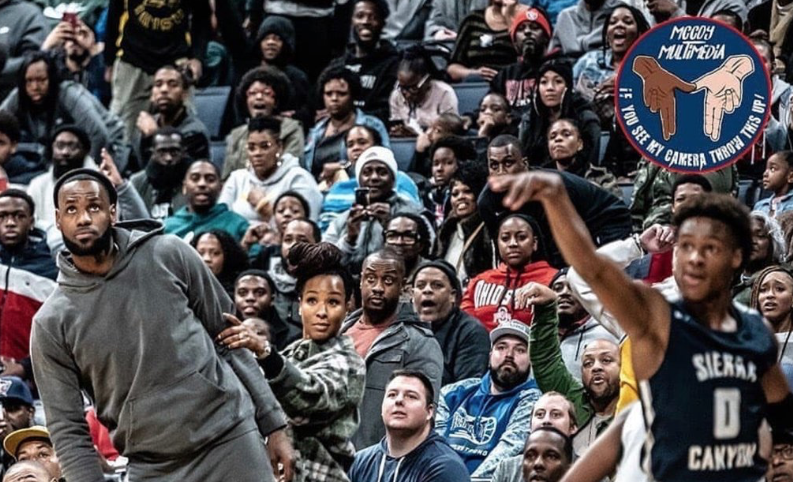 LEBRON JAMES AND WIFE SAVANNAH WATCHING THEIR SON LEAD HIS TEAM TO VICTORY AGAINST JAMES’S ALMA MATER IS ONE OF THE GREATEST SPORTS MOMENT EVER